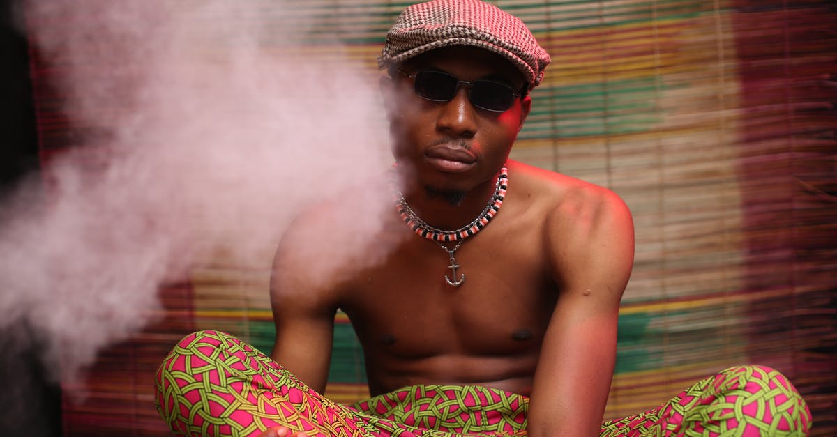 Is it illegal to vape in Mexico? - African American man smoking weed Is it illegal to vape in Mexico? - African American man smoking weed
