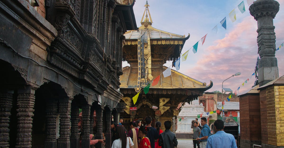 Is it legal for an Indian Citizen to travel to Nepal without any form of identification? - People Walking on Street Near Brown Concrete Building Is it legal for an Indian Citizen to travel to Nepal without any form of identification? - People Walking on Street Near Brown Concrete Building