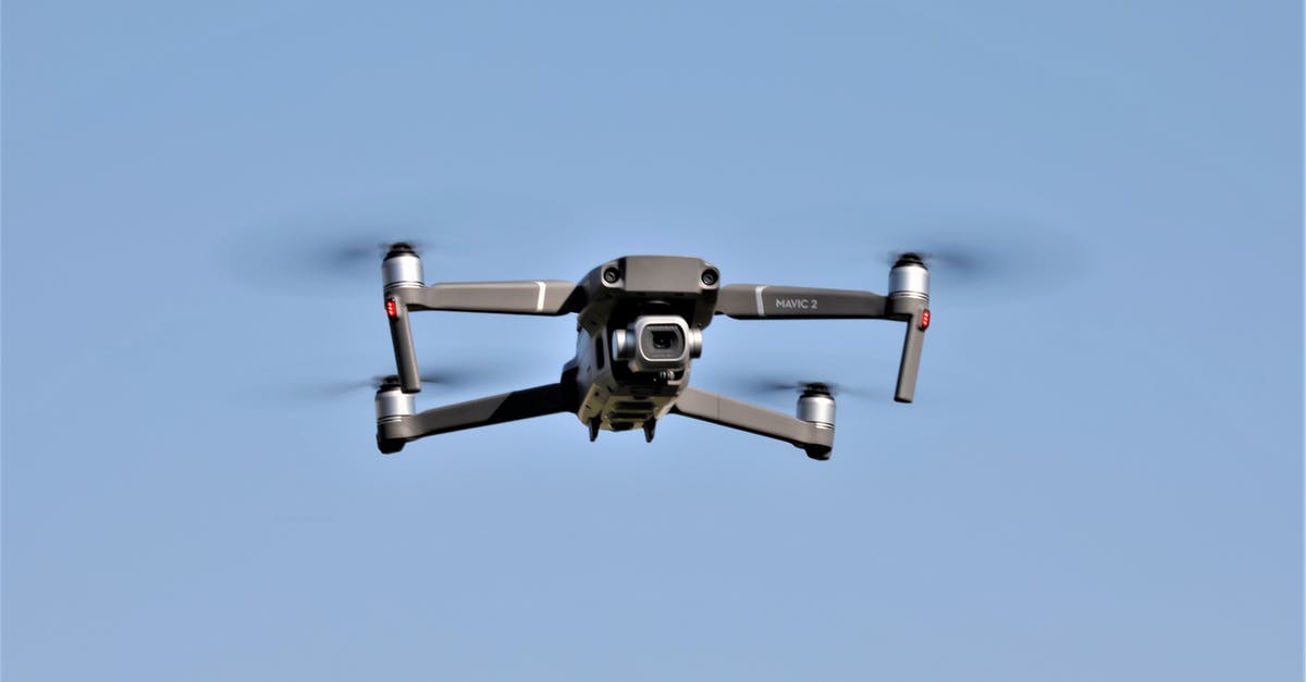 Is it legal to have 2 flights in the air at the same time with the same flight #? - Black and Gray Drone Flying in the Sky