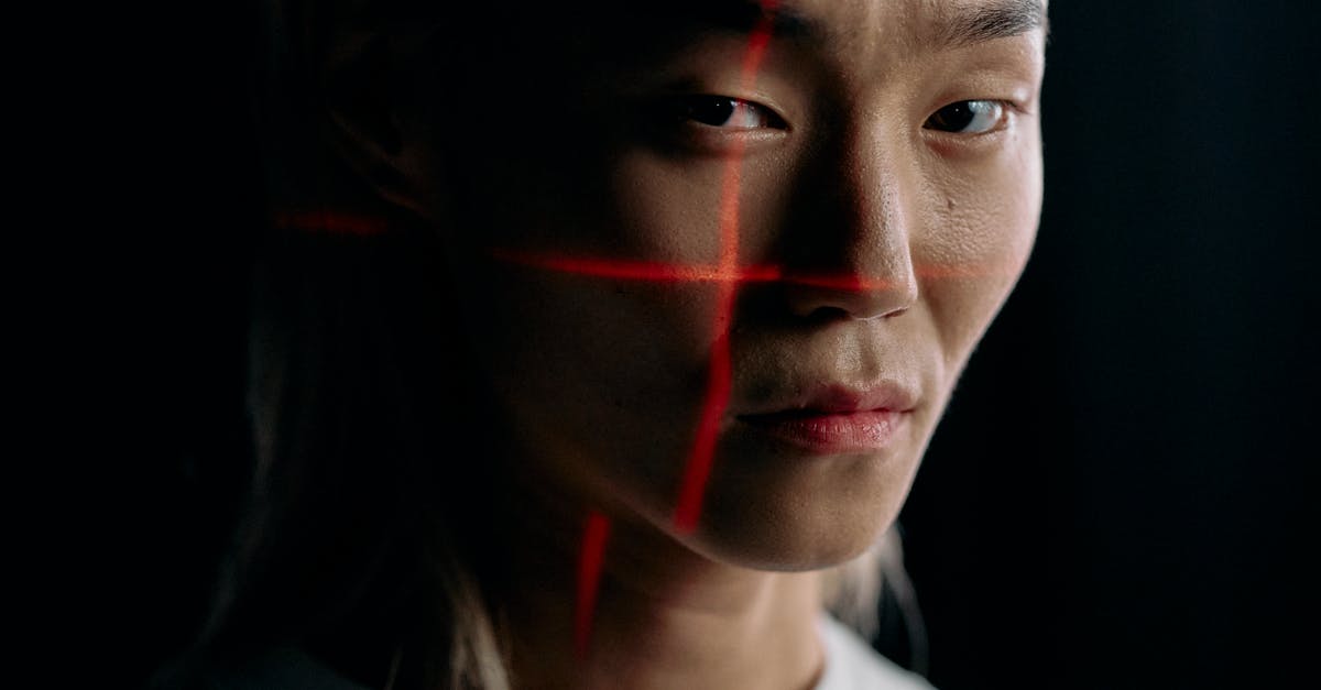 Is it normal to be stopped by authorities and asked for ID in Paris? [closed] - Close Up Photo of Man with Laser Lines on his Face