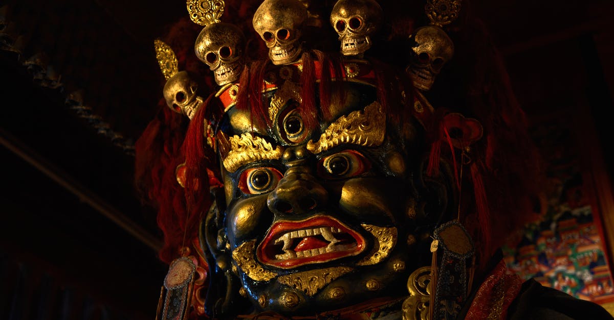 Is it ok to provide match tickets from third party sites - From below of Tsam mystery mask with gilded human face and third eye and pig nose and fangs among teeth and golden circles around face and full head of red hair decorated with red hairband adorned with golden skulls Is it ok to provide match tickets from third party sites - From below of Tsam mystery mask with gilded human face and third eye and pig nose and fangs among teeth and golden circles around face and full head of red hair decorated with red hairband adorned with golden skulls
