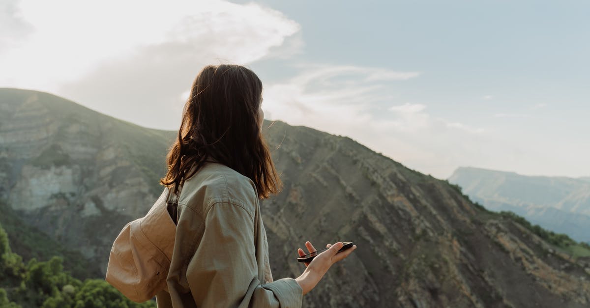 Is it possible to apply for a short-stay visa while I'm in Schengen area with a tourist visa? - Woman in Jacket Standing on Mountain Area Is it possible to apply for a short-stay visa while I'm in Schengen area with a tourist visa? - Woman in Jacket Standing on Mountain Area