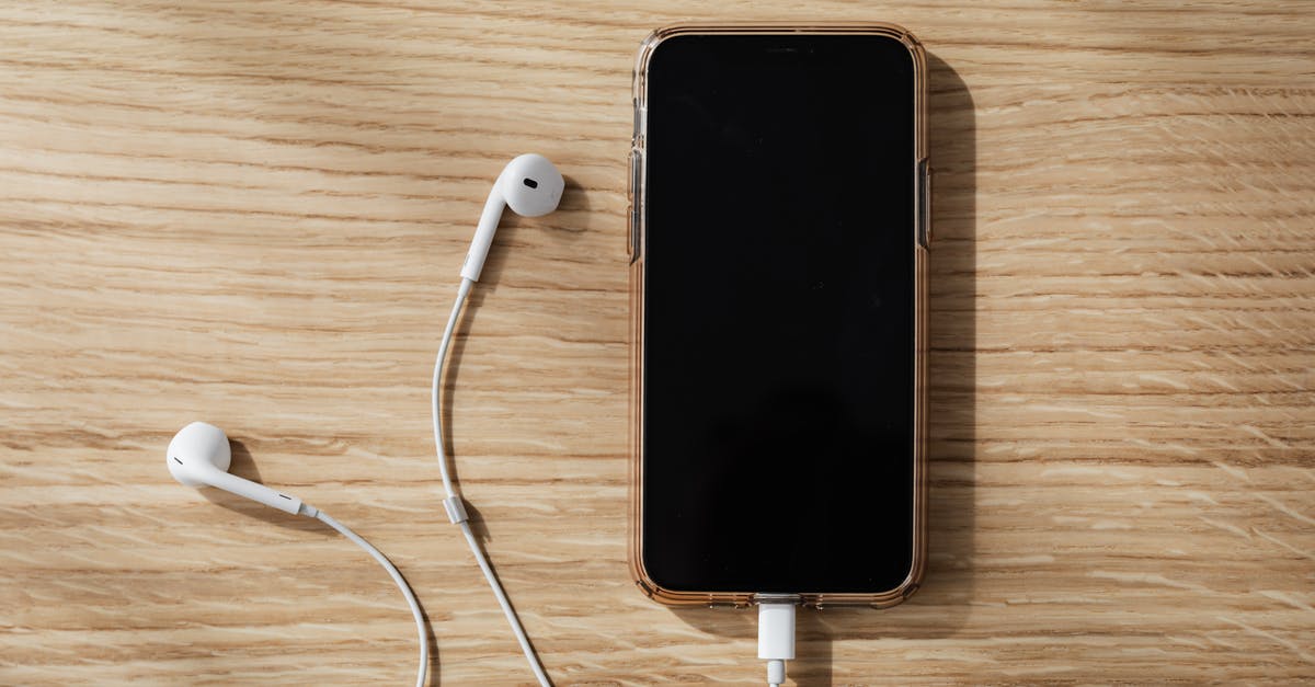 Is it possible to connect with Hainan Airlines from India/Bangladesh? - Charging smartphone and white earphones on wooden table Is it possible to connect with Hainan Airlines from India/Bangladesh? - Charging smartphone and white earphones on wooden table