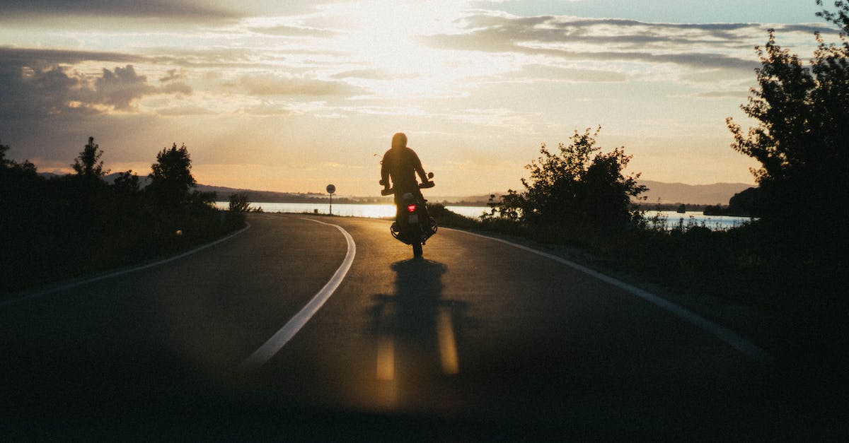 Is it possible to drive your own motorbike in/around Siem Reap? - Person Riding Motorcycle during Golden Hour Is it possible to drive your own motorbike in/around Siem Reap? - Person Riding Motorcycle during Golden Hour