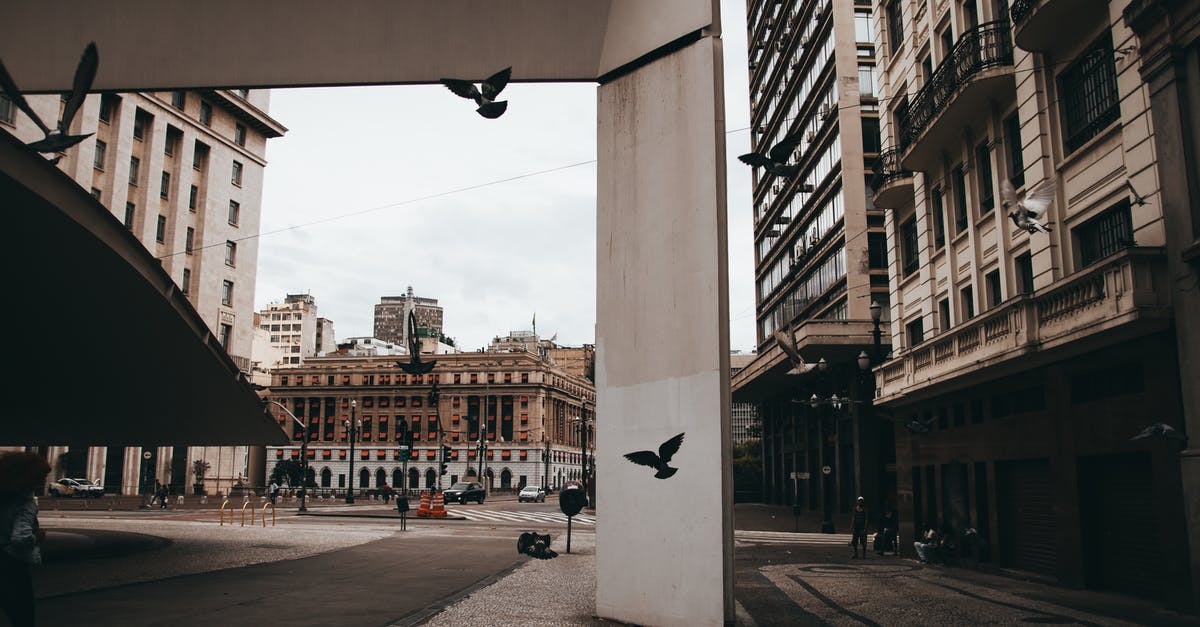 Is it possible to enter Schengen area flying without a ticket to fly-out? - Concrete Buildings Under Clear Sky Is it possible to enter Schengen area flying without a ticket to fly-out? - Concrete Buildings Under Clear Sky