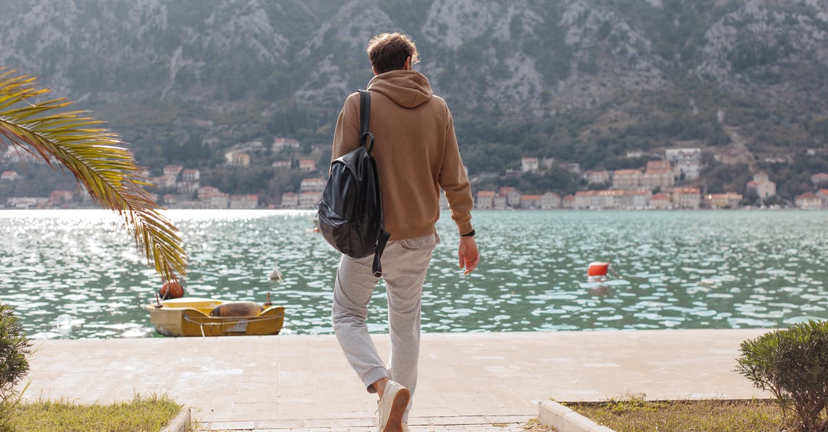 Is it possible to get a Canadian visa without concrete plans? - Man in Brown Hoodie Walking Near Water Is it possible to get a Canadian visa without concrete plans? - Man in Brown Hoodie Walking Near Water