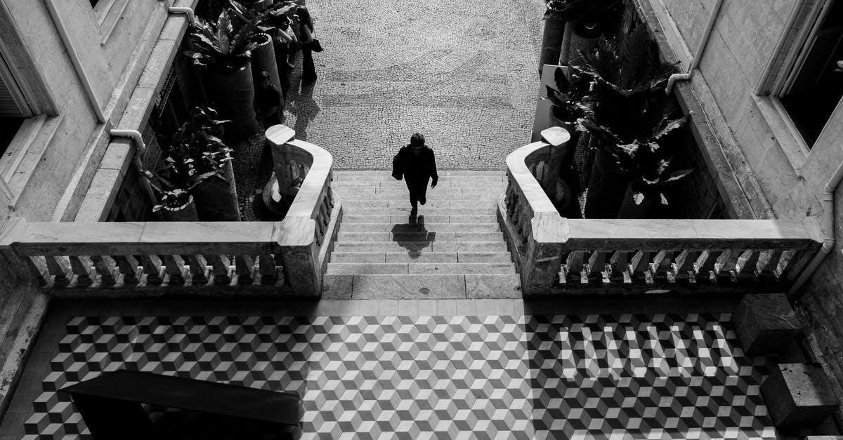 Is it possible to go overland from Yangon to Kathmandu? - Unrecognizable person walking upstairs on grand mansion entrance Is it possible to go overland from Yangon to Kathmandu? - Unrecognizable person walking upstairs on grand mansion entrance