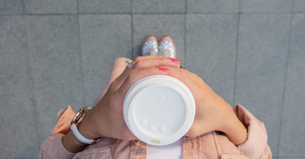 Is it possible to go overland from Yangon to Kathmandu? - Person Holding White Disposable Cup Is it possible to go overland from Yangon to Kathmandu? - Person Holding White Disposable Cup