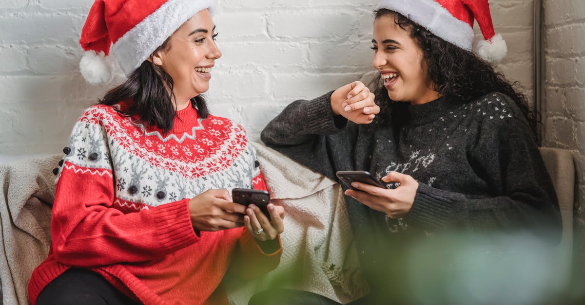 Is it possible to obtain a HES (Hayat Eve Sigar) code without a Turkish phone number? - Positive ethnic friends browsing smartphones and laughing together Is it possible to obtain a HES (Hayat Eve Sigar) code without a Turkish phone number? - Positive ethnic friends browsing smartphones and laughing together