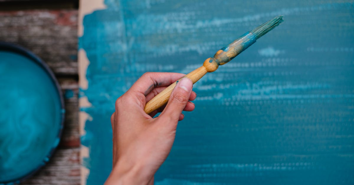 Is it possible to renew my US passport in person at a renewal facility? - Crop artist painting cardboard with brush Is it possible to renew my US passport in person at a renewal facility? - Crop artist painting cardboard with brush