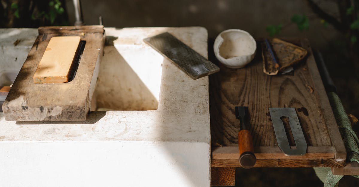Is it possible to take a soldering iron aboard an airplane? - Assorted carpentry instruments on old washbasin outdoors Is it possible to take a soldering iron aboard an airplane? - Assorted carpentry instruments on old washbasin outdoors