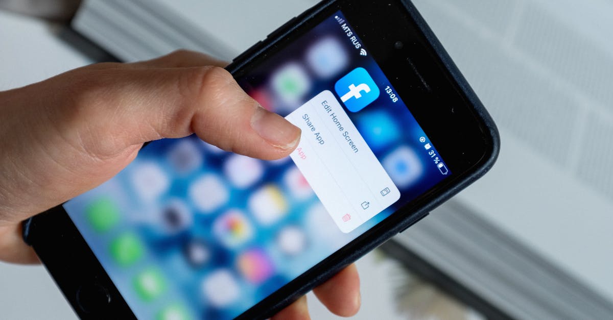 Is it possible to use hostel booking for a UK Standard Visitor visa application or must it be a hotel? [duplicate] - From above of crop anonymous person touching blurred cellphone screen while opening app and choosing option from pop up window