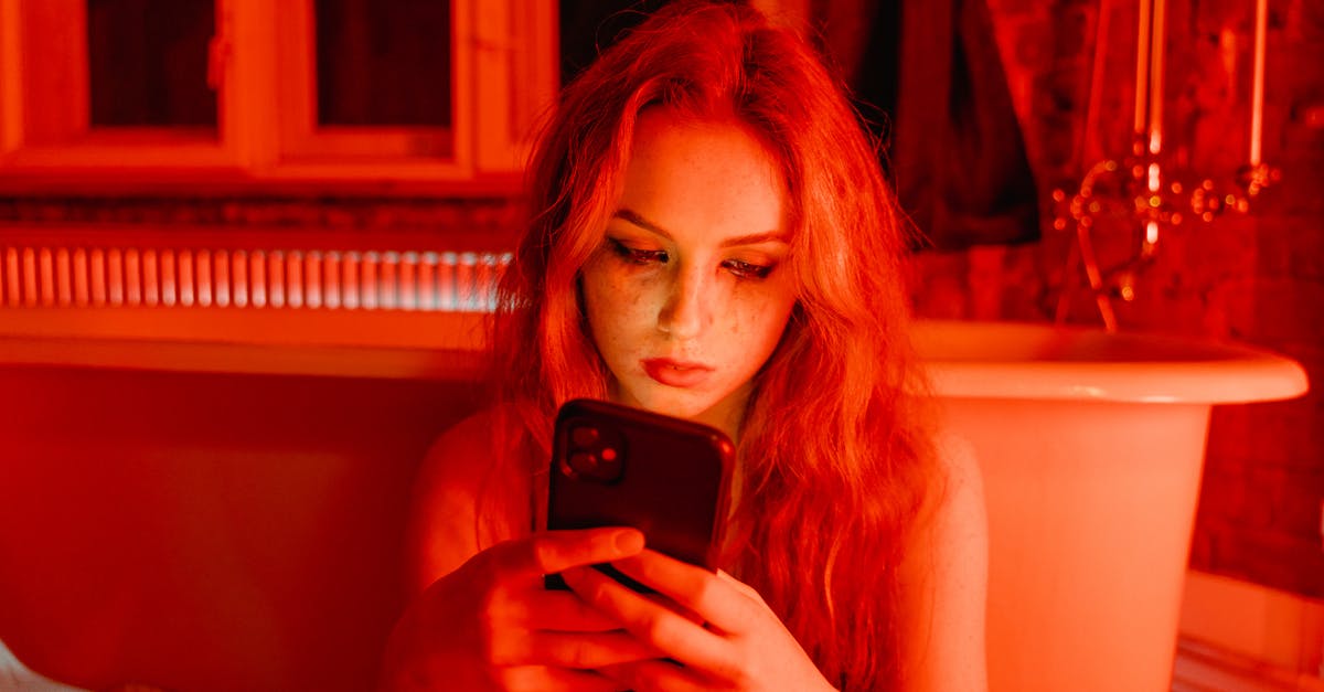 Is it possible to use HTC Desire C phone in Russia? - Woman with Smudge on Face Holding Cellphone Is it possible to use HTC Desire C phone in Russia? - Woman with Smudge on Face Holding Cellphone