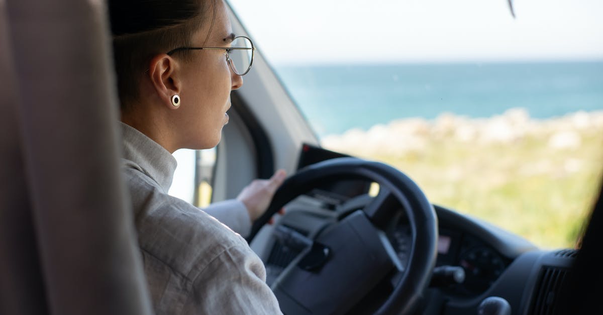 Is it reasonable / expected that French 'driving accessories' are provided with a rental car? - Man in Gray Shirt Driving Car Is it reasonable / expected that French 'driving accessories' are provided with a rental car? - Man in Gray Shirt Driving Car