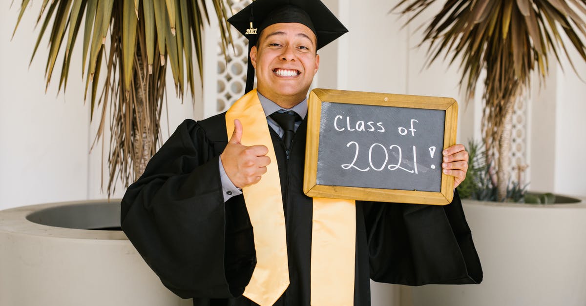 Is It required to provide Marriage certificate for Separated Spouse applying for student visa? - Proud Man Smiling Wearing Graduation Gown Holding a Board of Class Of 2021 Is It required to provide Marriage certificate for Separated Spouse applying for student visa? - Proud Man Smiling Wearing Graduation Gown Holding a Board of Class Of 2021