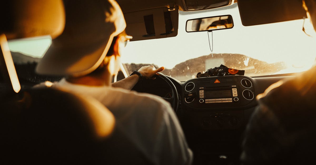 Is it rude to give up your seat in Japan? - Man Holding the Steering Wheel While Driving Is it rude to give up your seat in Japan? - Man Holding the Steering Wheel While Driving