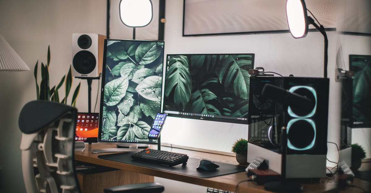 Is it rude to give up your seat in Japan? - Black Flat Screen Computer Monitor on White Wooden Desk Is it rude to give up your seat in Japan? - Black Flat Screen Computer Monitor on White Wooden Desk