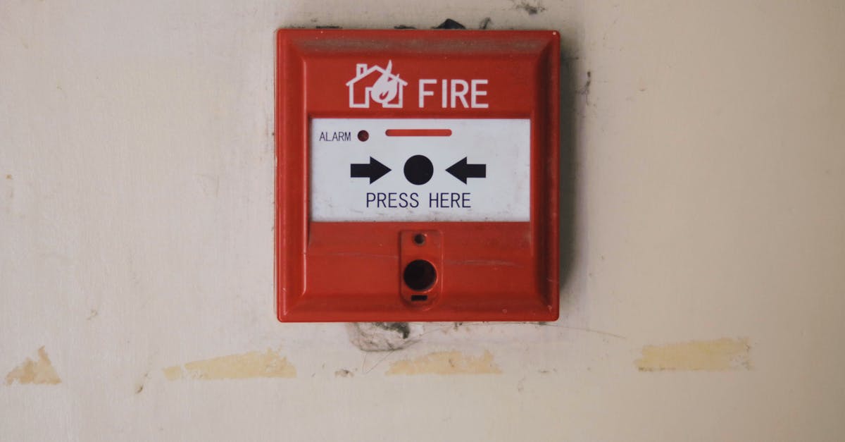 Is it safe to use non-cash payment in Amsterdam red light district? - Emergency safety fire detection system box for safety with inscription and push button placed on white wall in light room Is it safe to use non-cash payment in Amsterdam red light district? - Emergency safety fire detection system box for safety with inscription and push button placed on white wall in light room
