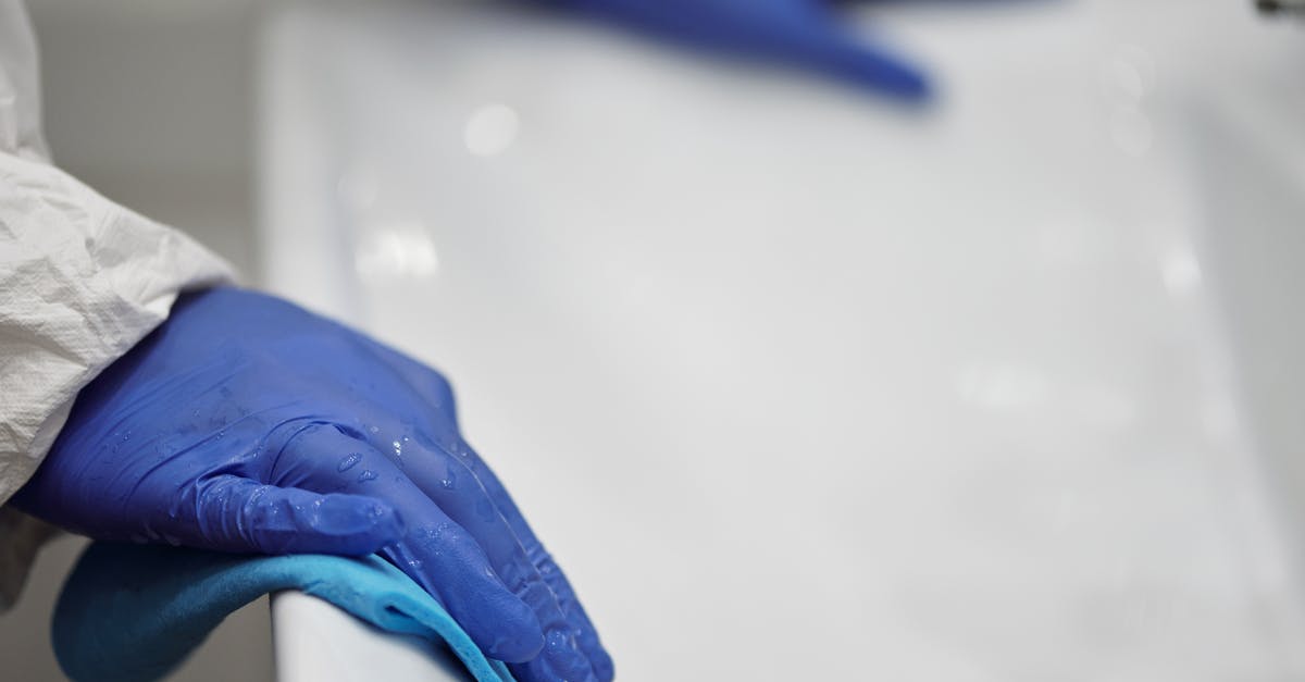 Is it the norm for hotels not to provide washing service for undergarments in India? - Person in Blue Gloves Cleaning White Sink Is it the norm for hotels not to provide washing service for undergarments in India? - Person in Blue Gloves Cleaning White Sink
