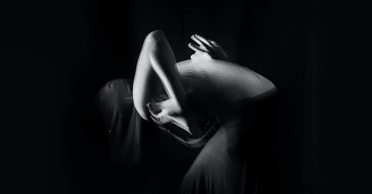 Is it true that a "dekoriert"-sign means that naked women are dancing? - Side view of black and white unrecognizable topless female dancer leaning forward while performing sensual movements in darkness Is it true that a "dekoriert"-sign means that naked women are dancing? - Side view of black and white unrecognizable topless female dancer leaning forward while performing sensual movements in darkness