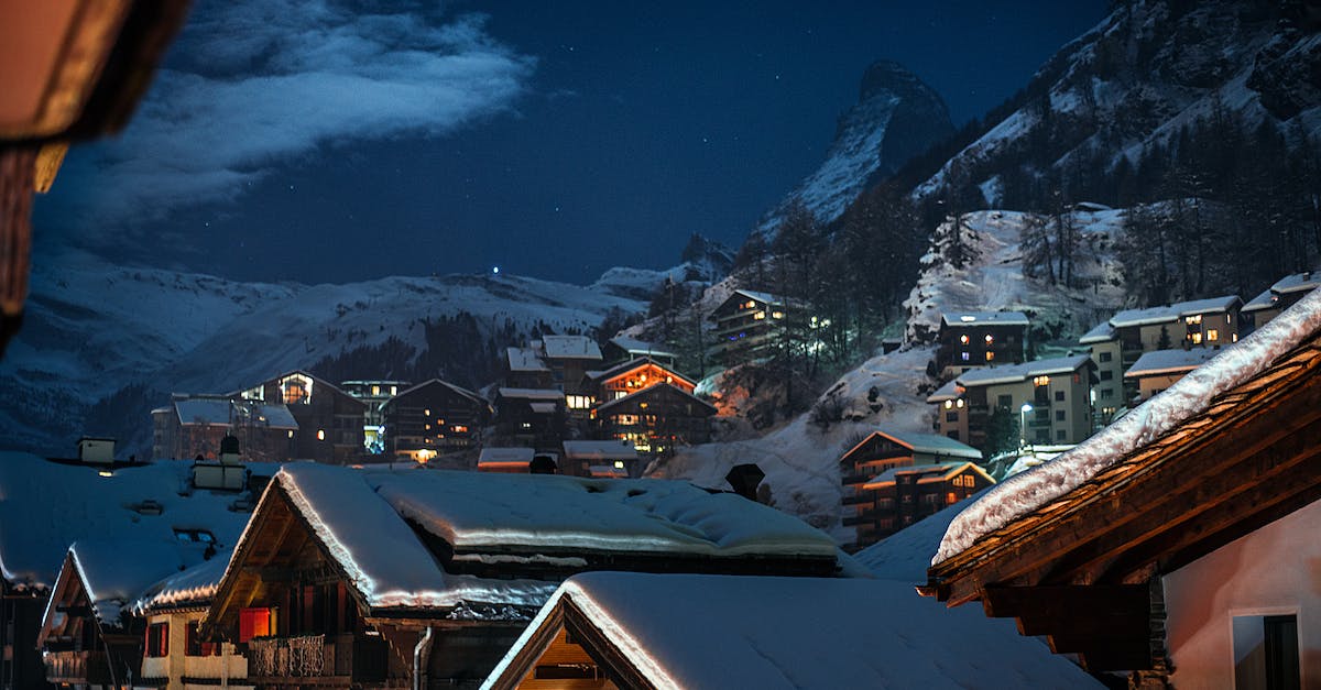 Is Mount Pilatus worth visiting in winter? - Village with residential houses on snowy mounts Is Mount Pilatus worth visiting in winter? - Village with residential houses on snowy mounts