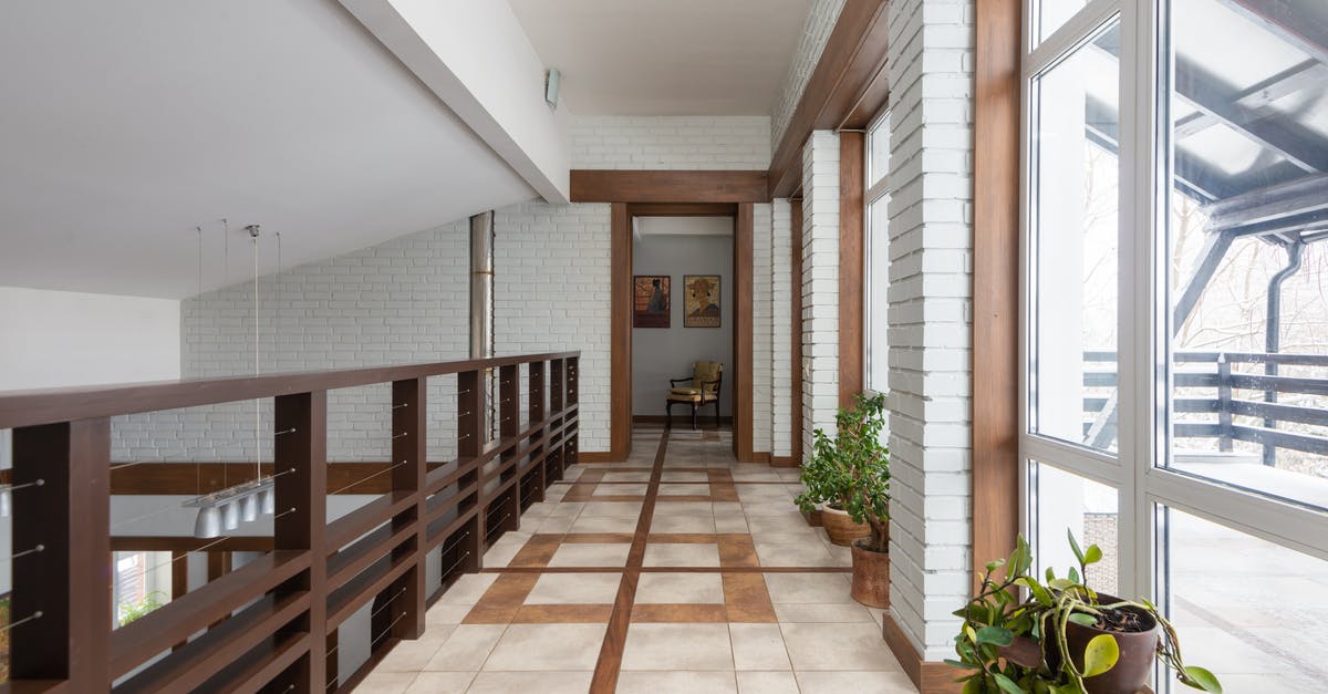 Is my ESTA valid for a second trip? - Long corridor with wooden railing and potted green flowers placed near bid windows located on second floor of contemporary house Is my ESTA valid for a second trip? - Long corridor with wooden railing and potted green flowers placed near bid windows located on second floor of contemporary house
