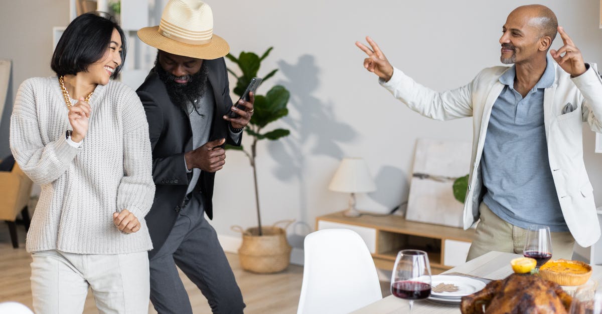 Is my Turkey e-Visa valid if I have used my single-entry Schengen visa? [duplicate] - Happy multiethnic friends dancing together near table with dishes