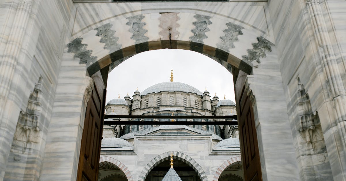 Is Portugal open for travelers from Turkey - Ornamental arched entrance gate to oriental mosque in daylight Is Portugal open for travelers from Turkey - Ornamental arched entrance gate to oriental mosque in daylight
