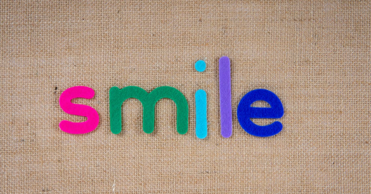 Is "relatively low" flight prices plus "no fee for change" as good as it sounds? - Text Smile In Colorful Cutouts