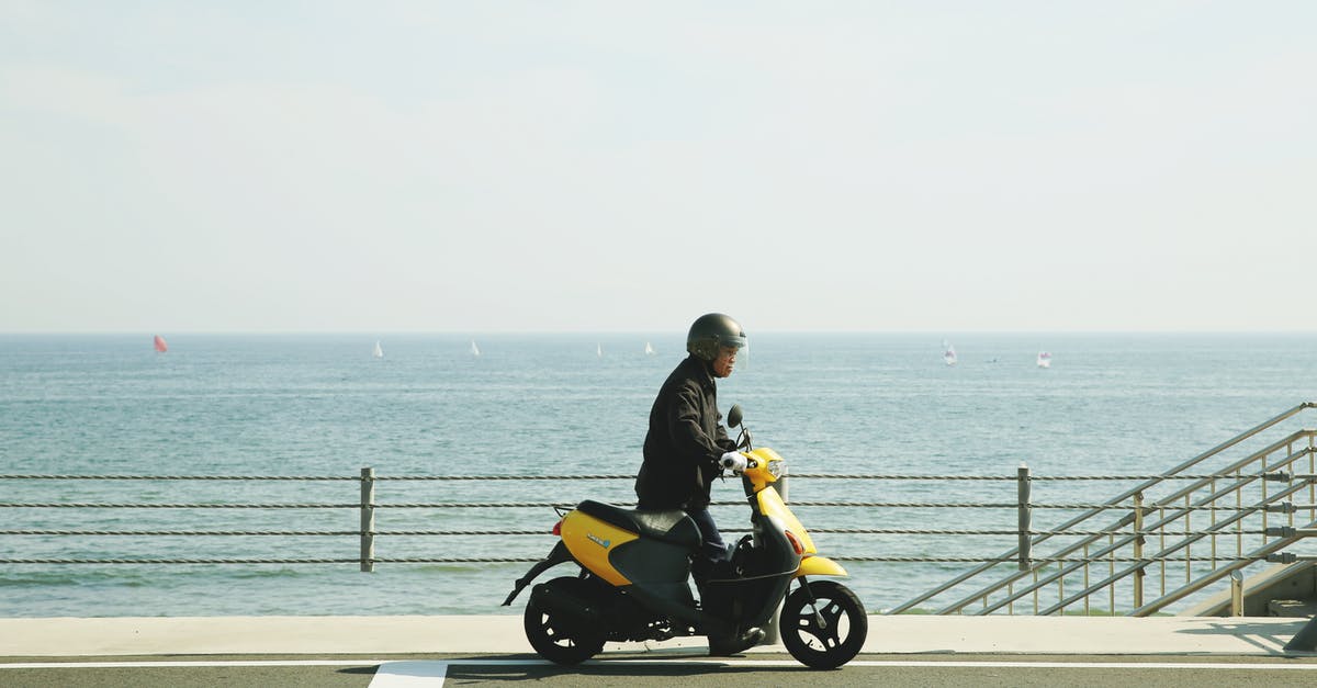 Is riding an electric scooter on pavement not tolerated in London? [closed] - Man Riding Yellow Motor Scooter on Road