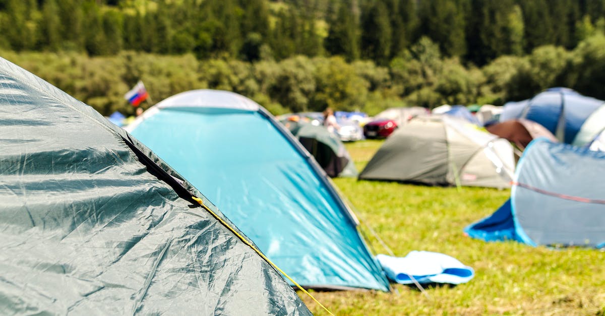 Is sleeping outside really illegal in Laos? If so does that mean no camping too? - Tents Surrounded by Trees Is sleeping outside really illegal in Laos? If so does that mean no camping too? - Tents Surrounded by Trees