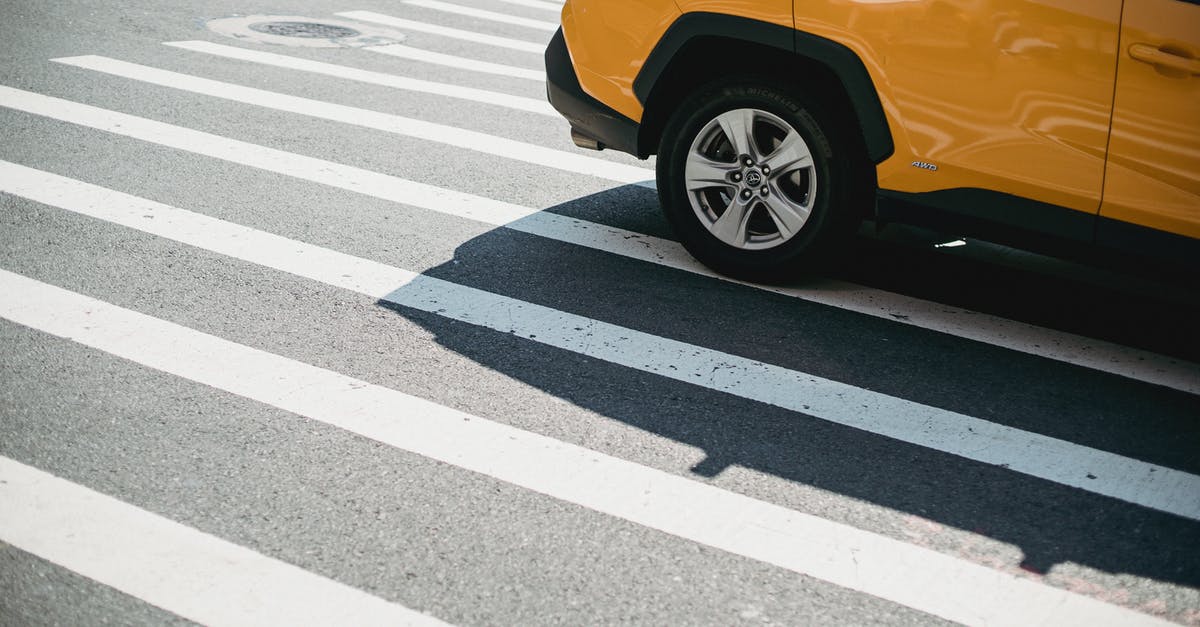Is the Antequera-Granada high speed line open after 2019-12-15? - Contemporary yellow car driving on pedestrian crossing on city street in sunny day Is the Antequera-Granada high speed line open after 2019-12-15? - Contemporary yellow car driving on pedestrian crossing on city street in sunny day