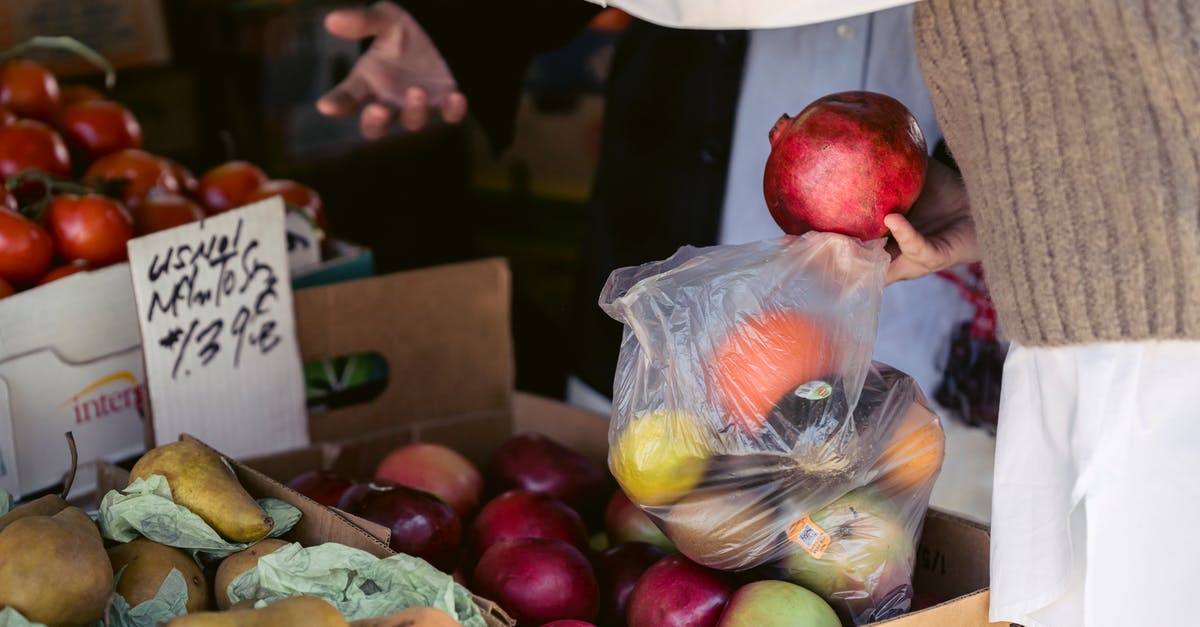 Is the Apple SIM pricing comparable to buying a local sim-card? - Crop woman choosing assorted healthy fruits in street market Is the Apple SIM pricing comparable to buying a local sim-card? - Crop woman choosing assorted healthy fruits in street market