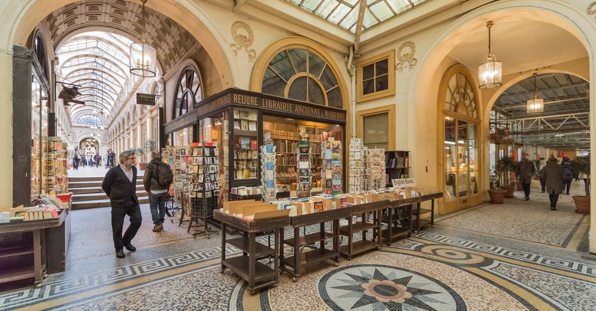 Is the couvert mandatory or optional in Italy? - People Walking Inside Building Is the couvert mandatory or optional in Italy? - People Walking Inside Building