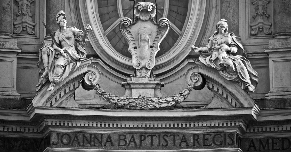 Is the couvert mandatory or optional in Italy? - Gray Scale Photo of Concrete Building Is the couvert mandatory or optional in Italy? - Gray Scale Photo of Concrete Building