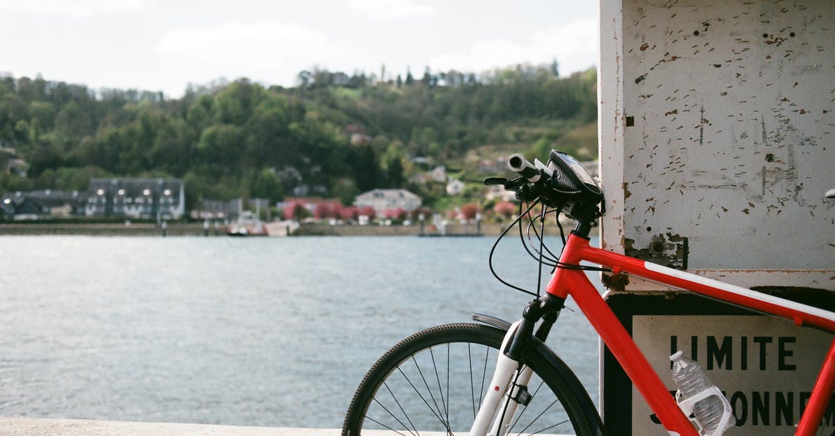 Is the Dunkirk area suitable for bicycling? - Bicycle parked on embankment near river Is the Dunkirk area suitable for bicycling? - Bicycle parked on embankment near river