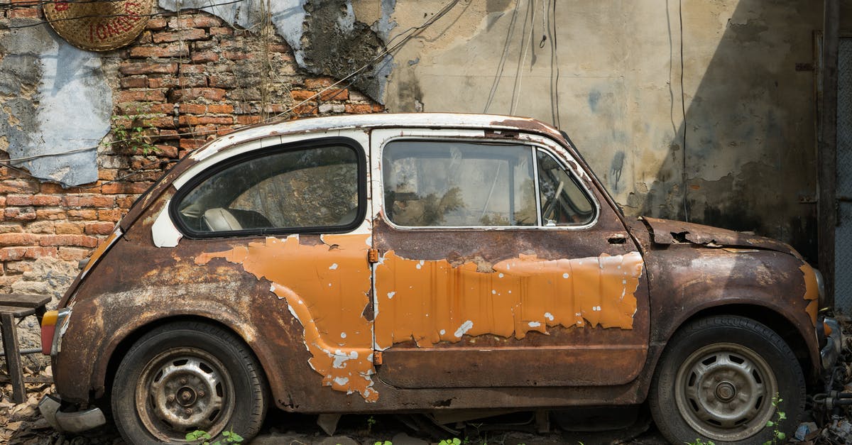 Is the Indian e-visa in a damaged old passport still valid? - Brown Car Parked Beside Brown Brick Wall Is the Indian e-visa in a damaged old passport still valid? - Brown Car Parked Beside Brown Brick Wall
