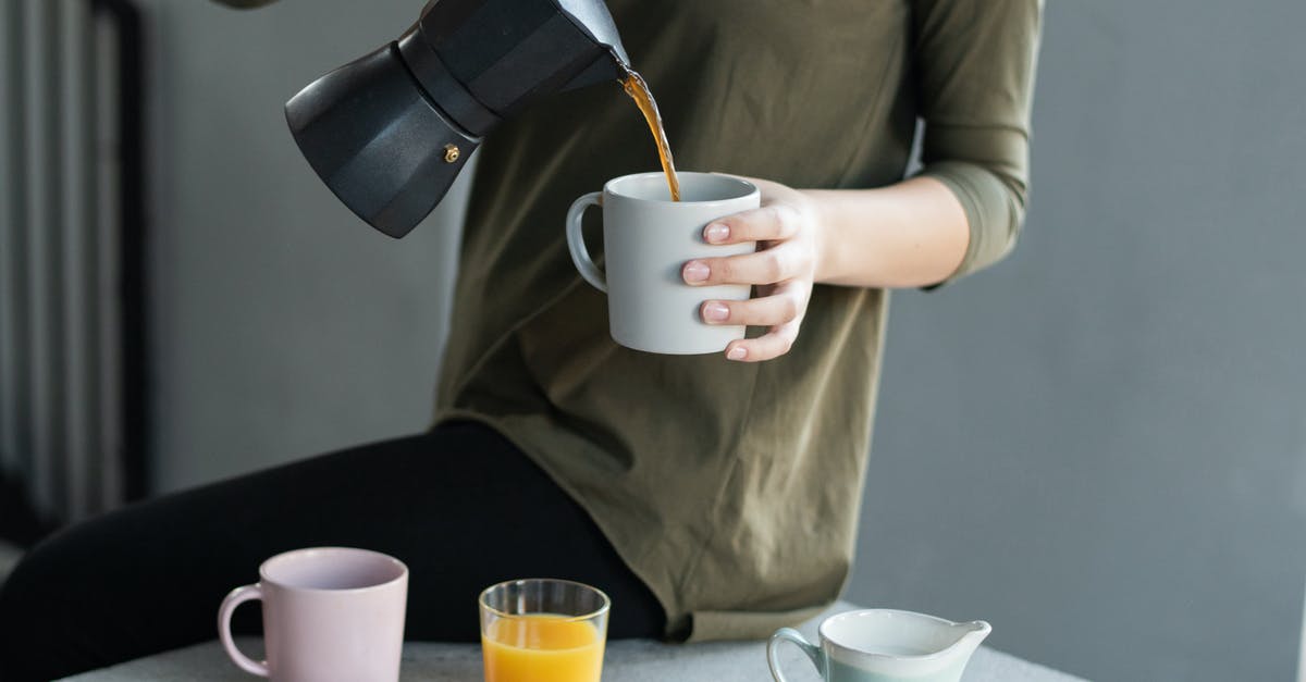 Is the Sudbury Slag Pour still a thing? - Woman in Green Top Pouring Coffee in a White Mug Is the Sudbury Slag Pour still a thing? - Woman in Green Top Pouring Coffee in a White Mug