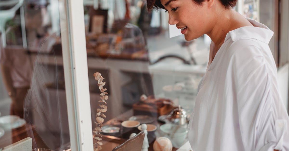 Is the tax-free allowance applicable per item or per total cost of all items combined in a baggage - Side view of crop young smiling ethnic female watching assortment of store through glass wall in city Is the tax-free allowance applicable per item or per total cost of all items combined in a baggage - Side view of crop young smiling ethnic female watching assortment of store through glass wall in city