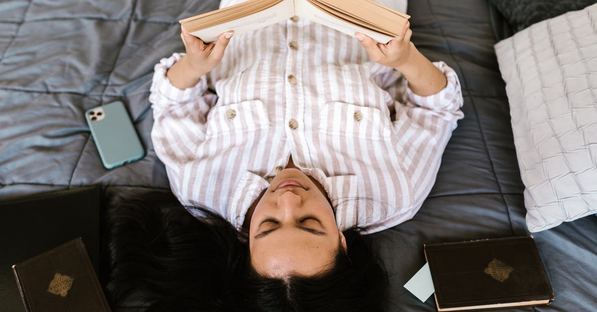 Is there a booking site for chartering flights? - Woman in White and Blue Button Up Shirt Lying on Bed Is there a booking site for chartering flights? - Woman in White and Blue Button Up Shirt Lying on Bed