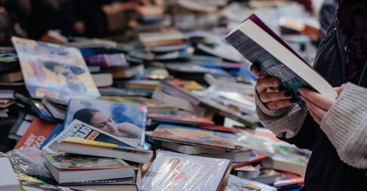 Is there a bookstore at Heathrow with a good selection of LP or Moon guides? - A Person Selecting a Book Is there a bookstore at Heathrow with a good selection of LP or Moon guides? - A Person Selecting a Book