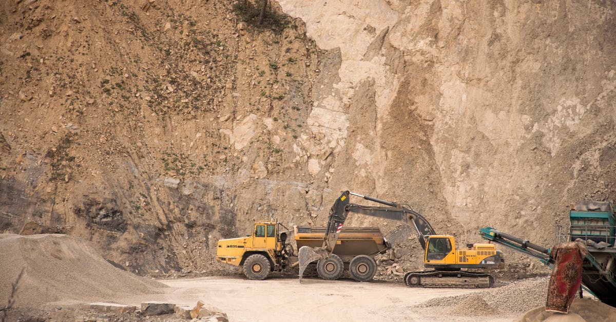Is there a free resource to track a specific plane's upcoming routes? - Excavator near industrial machines in quarry