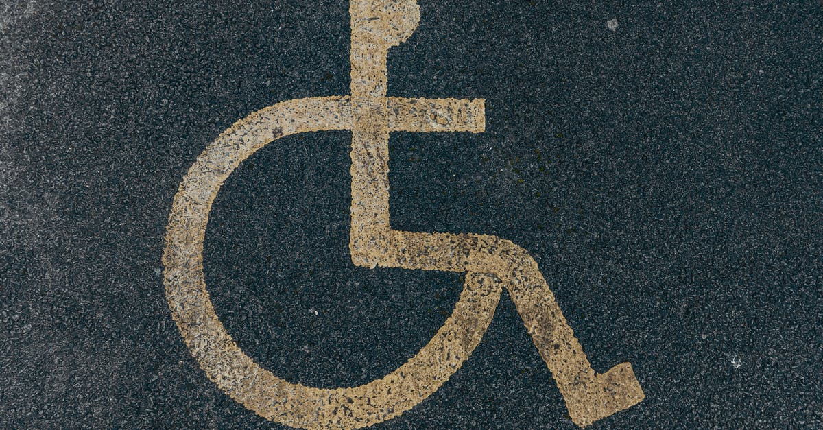 Is there a guide to underpasses in London which don't access Tube stations? [closed] - Painted Disability Icon on Asphalt Pavement