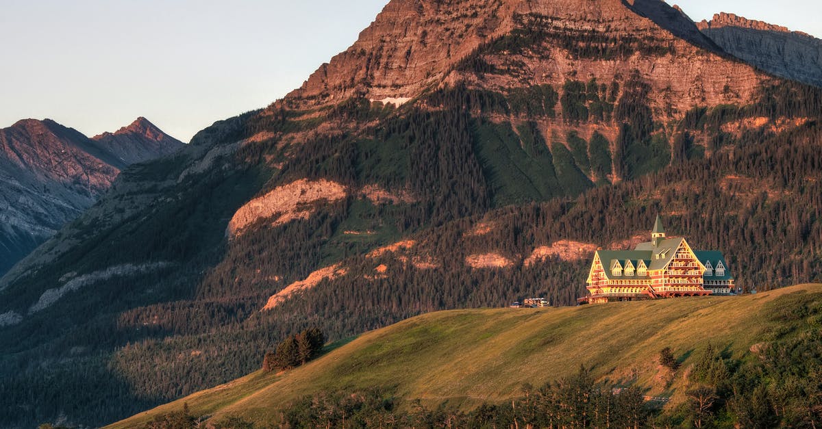 Is there a hotel aggregation site that can sort by TripAdvisor rating? - Brown and Blue House Near Mountain