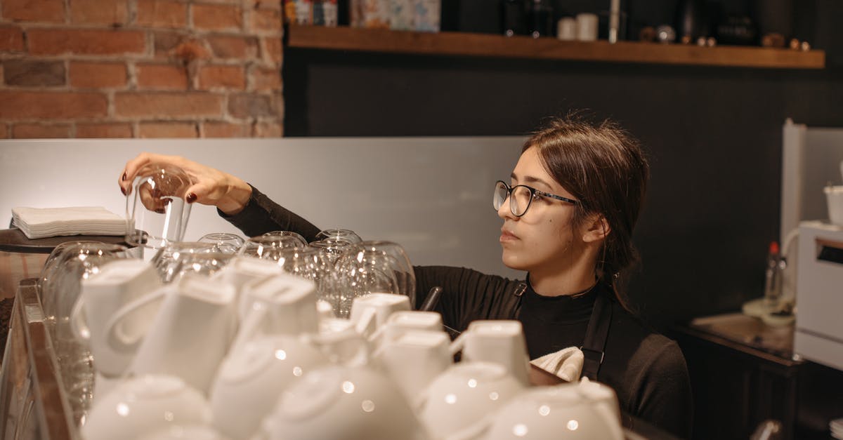 Is there a hotel search engine which allows one to exclude shared rooms? [duplicate] - Woman in Black Long Sleeve Shirt Holding Clear Drinking Glass