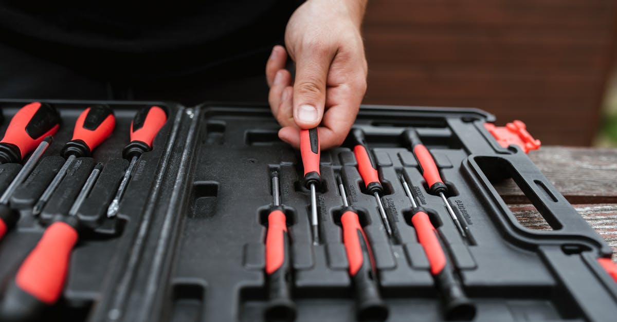 Is there a hotel search tool that allows me to see prices for potential dates? [duplicate] - Faceless master choosing screwdriver from toolbox