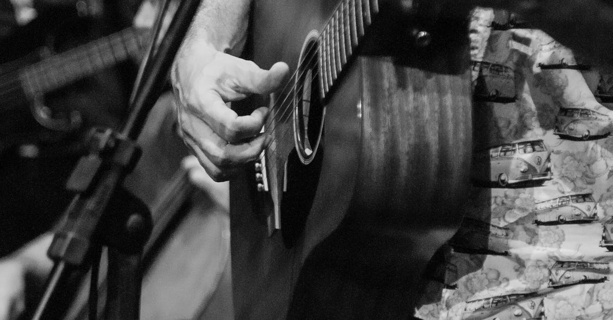 Is there a list of Greyhound partner bus carriers? - Black and white of crop anonymous male musicians playing classical guitar and cello during musical performance Is there a list of Greyhound partner bus carriers? - Black and white of crop anonymous male musicians playing classical guitar and cello during musical performance