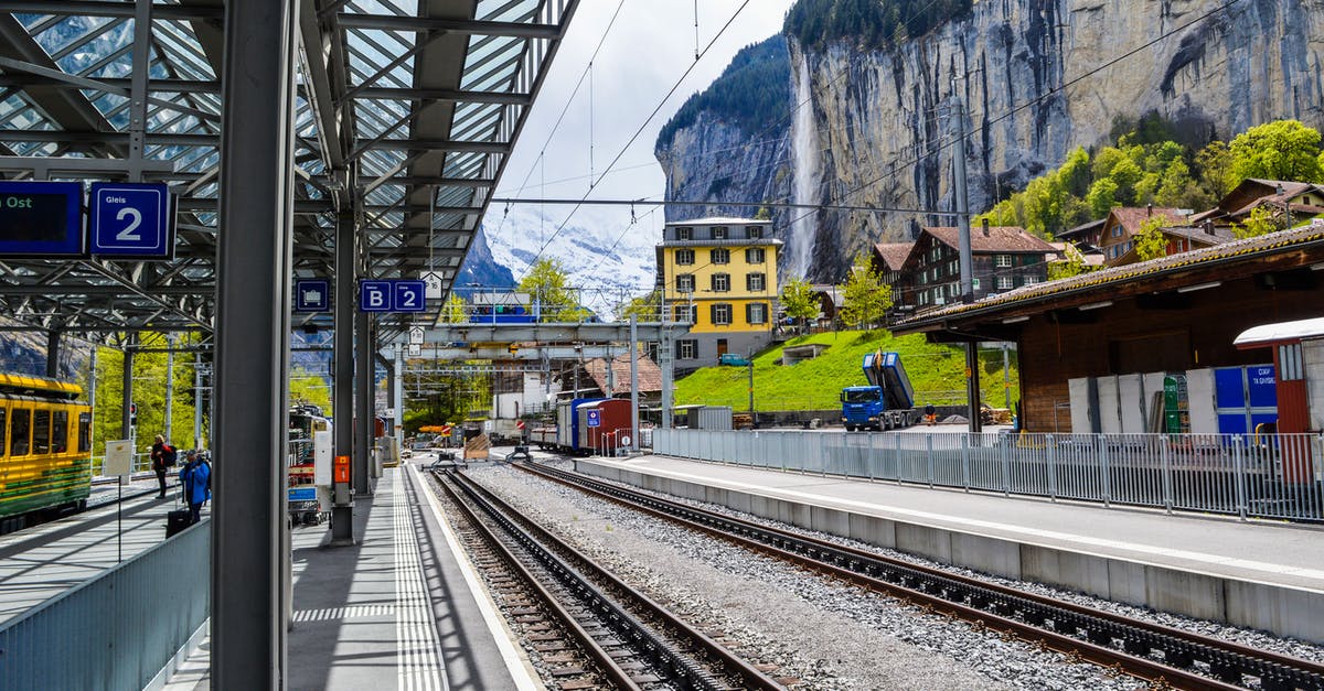 Is there a place to store bags in Gokurakabashi railway station or Mount Koya? - Railroads near station and rough mountains under sky Is there a place to store bags in Gokurakabashi railway station or Mount Koya? - Railroads near station and rough mountains under sky