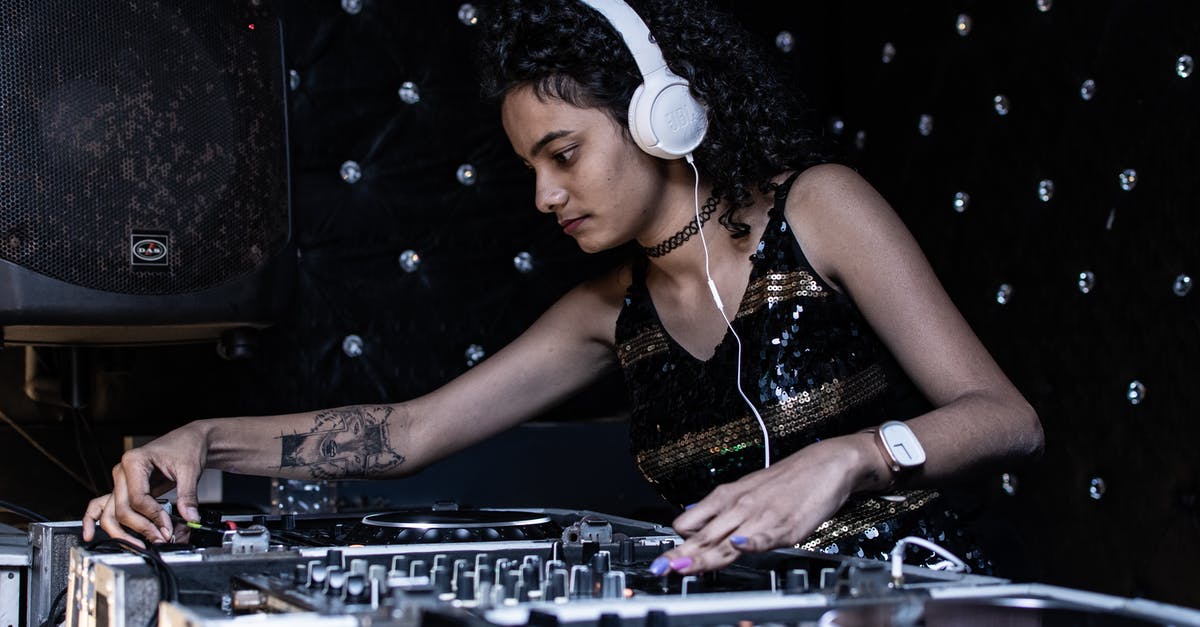 Is there a popular non-Google Korean-English-Korean translator app? - Focused ethnic female DJ playing music at nightclub Is there a popular non-Google Korean-English-Korean translator app? - Focused ethnic female DJ playing music at nightclub