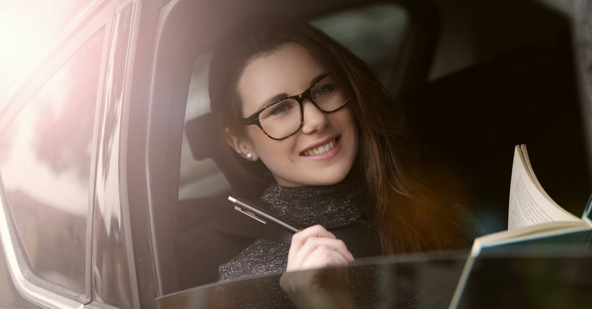 Is there a practical point in learning foreign words while travelling? - Woman in Black Framed Eyeglasses Holding Smartphone Is there a practical point in learning foreign words while travelling? - Woman in Black Framed Eyeglasses Holding Smartphone